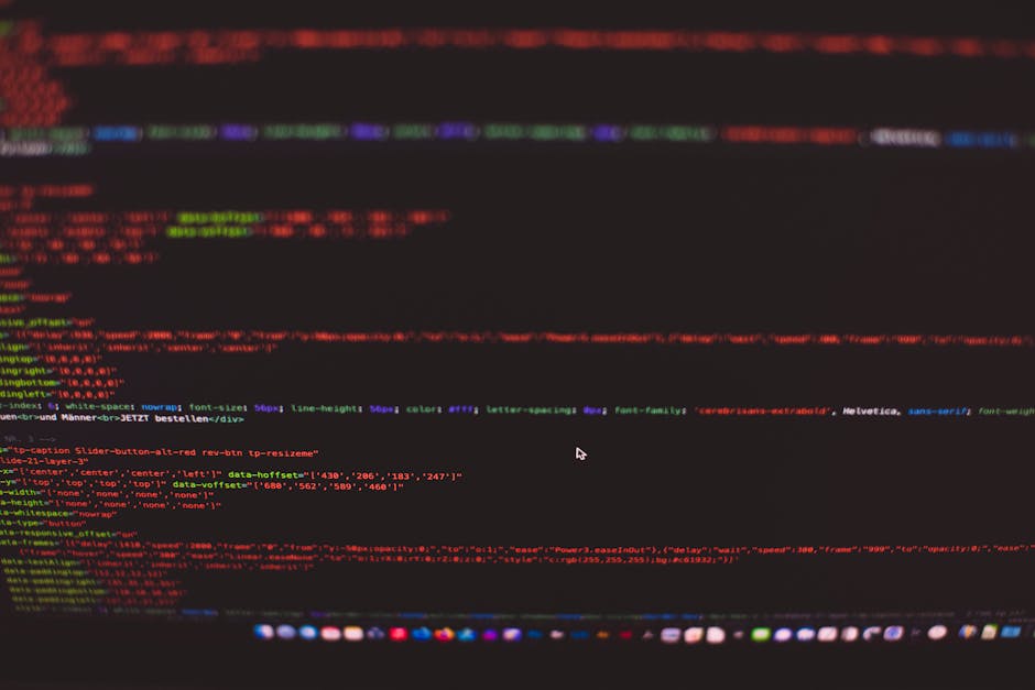 This image features a close-up view of a laptop with a black keyboard illuminated by red backlighting, displaying lines of code on its screen with a blurred background. In the foreground, a white Puma
